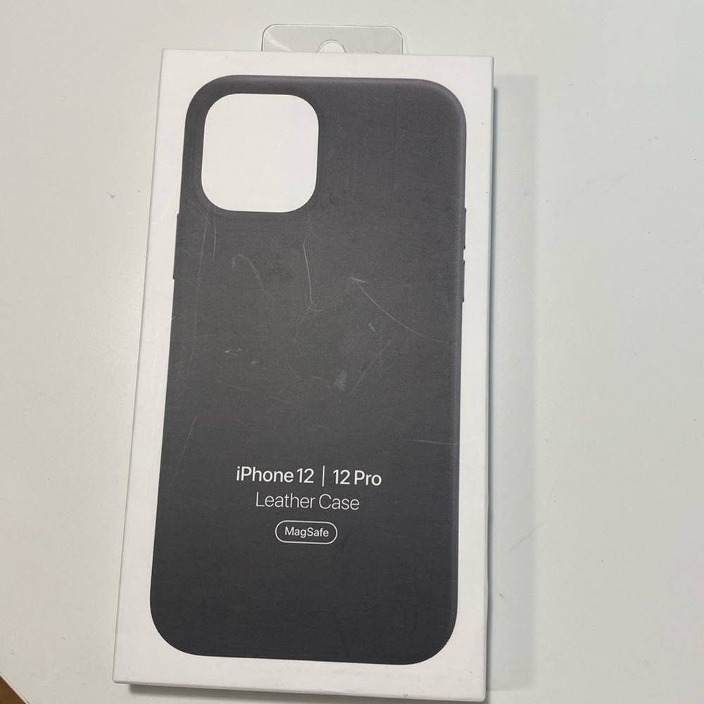Apple iPhone 12/12 pro ..black, leather case, barely used